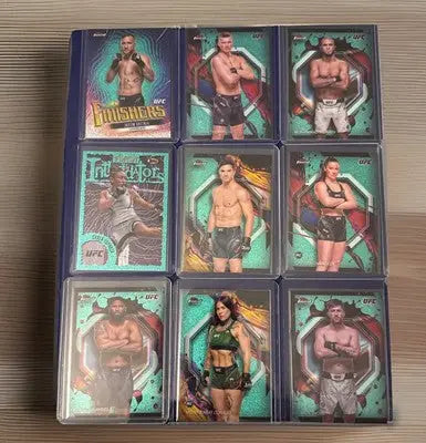Binder with nine UFC trading cards from the 2022-24 UFC 102 card lot collection