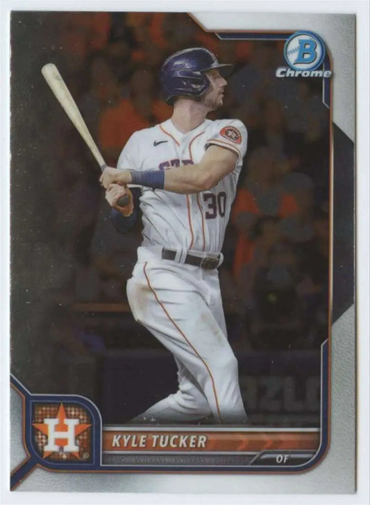 Baseball card of Kyle Tucker in white uniform for Houston Astros at bat