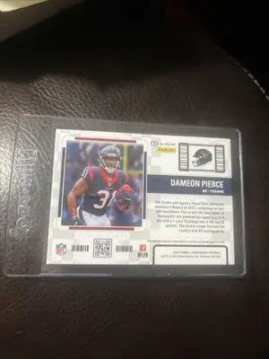 Dameon Pierce football card featuring green season ticket patch from 2022 Contenders Texans
