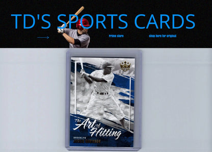Framed Jackie Robinson hitting blue holo baseball card from 2022 Diamond Kings series
