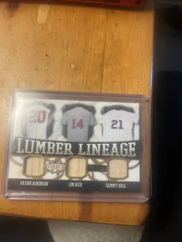 Baseball card featuring jersey swatches from Leaf Lumber Lineage Relics /25 collection