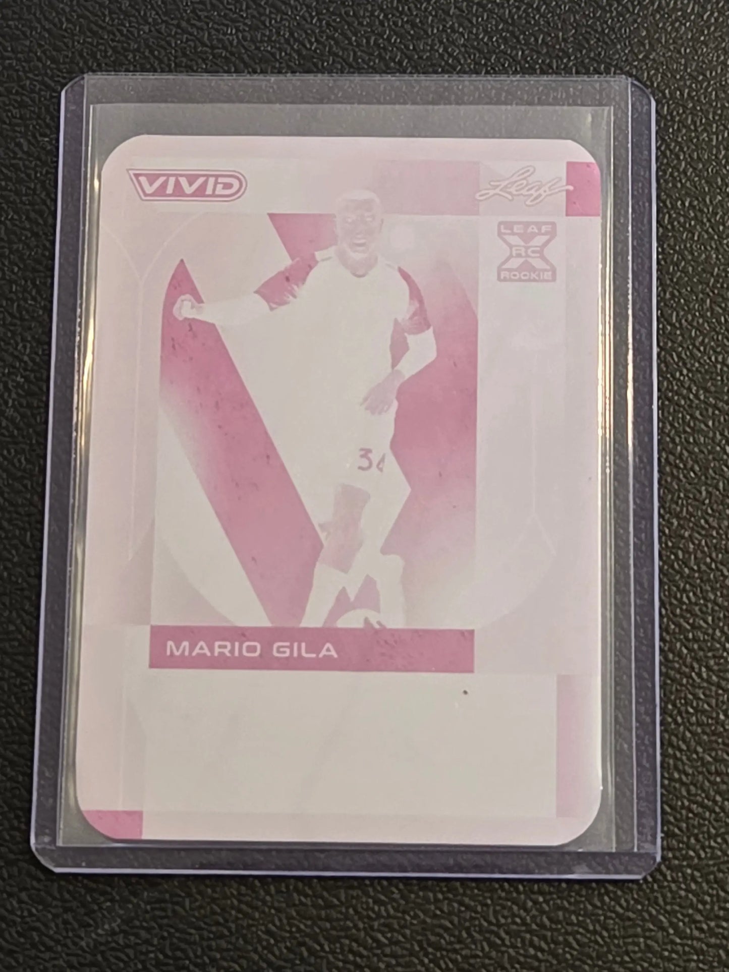 Pink-colored Mario Gila soccer trading card in a clear sleeve from 2022 Leaf Vivid Gila printing plates