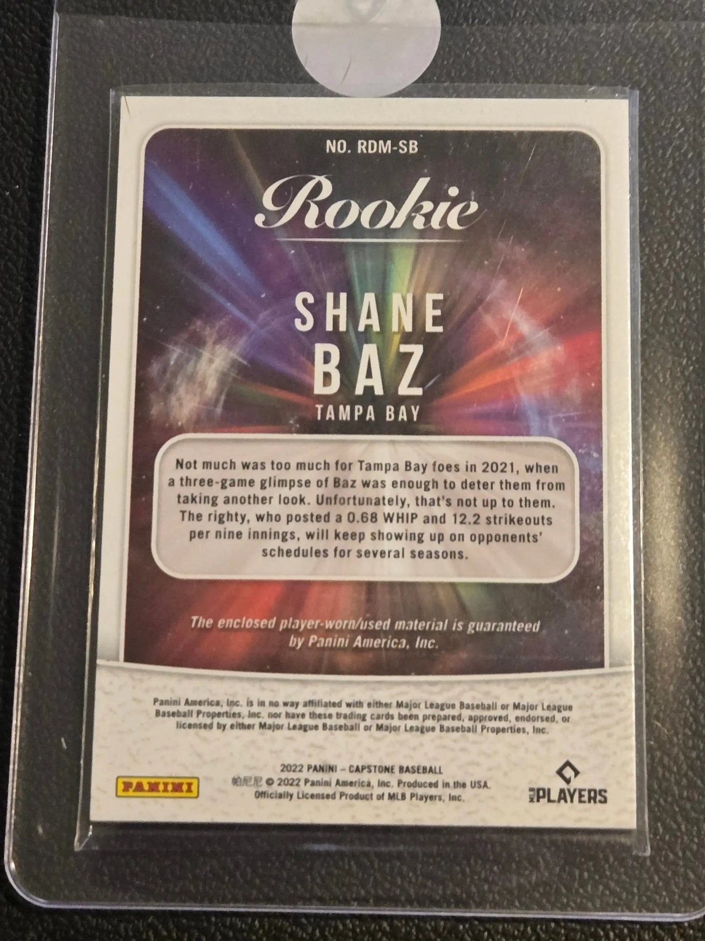 Baseball rookie card of Shane Baz from 2022 Panini Capstone Baz Rookie Dual Materials