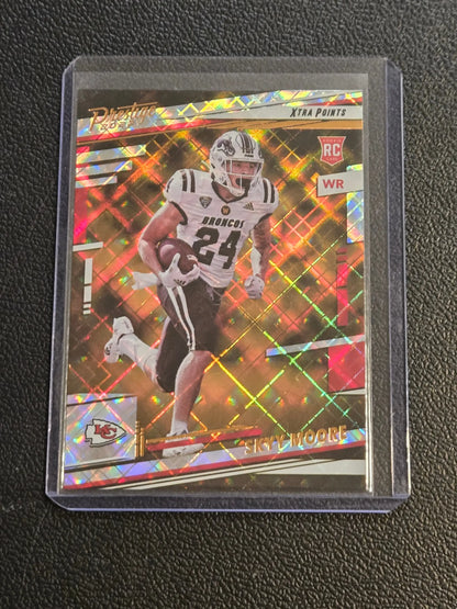 Football trading card of Skyy Moore in white and black uniform with holographic background