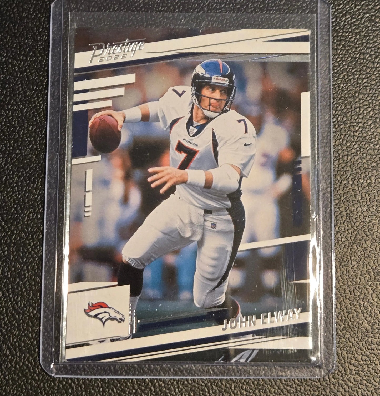 2022 Panini Prestige John Elway football card displayed in a collectible product