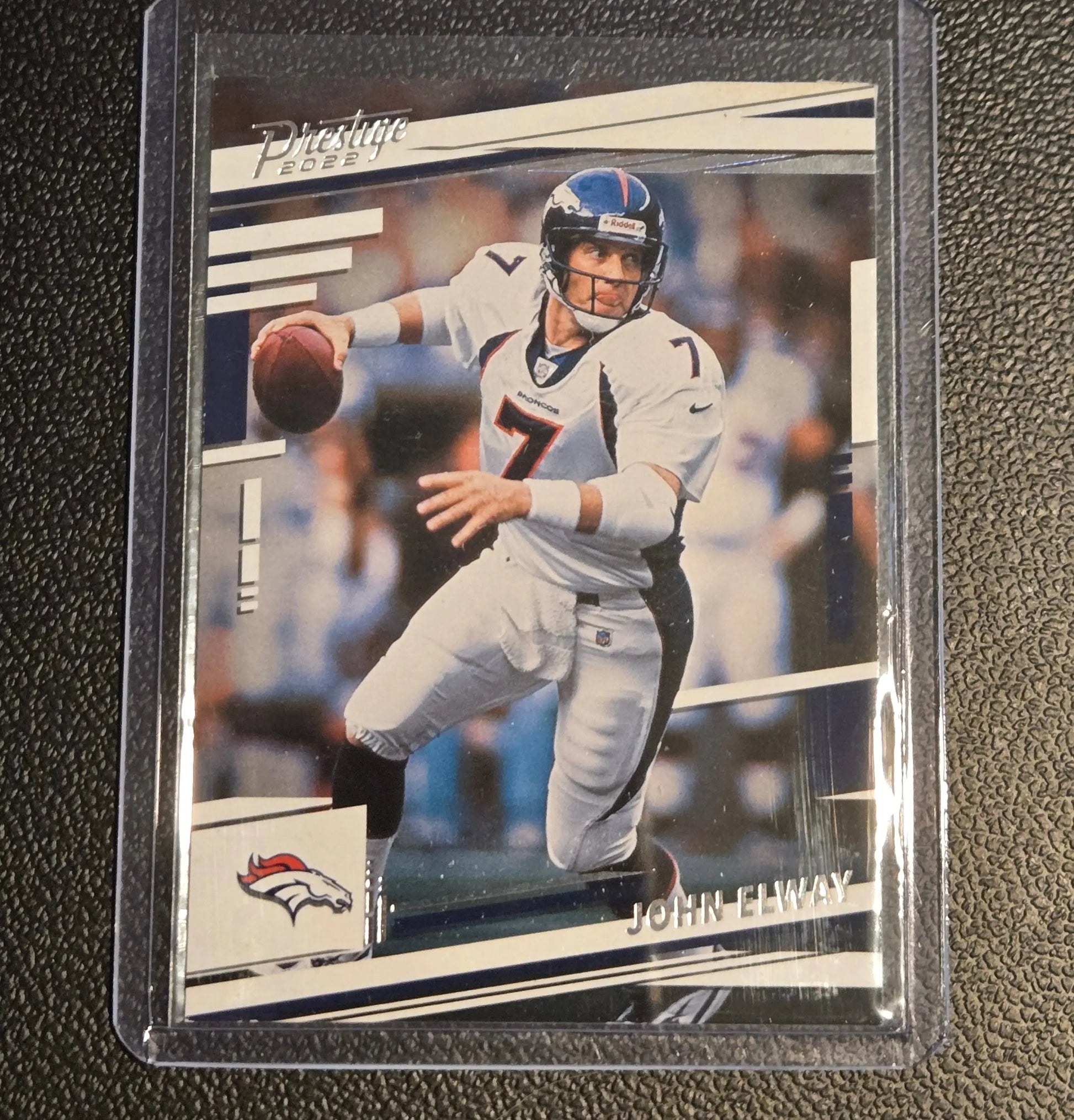 2022 Panini Prestige John Elway football card displayed in a collectible product