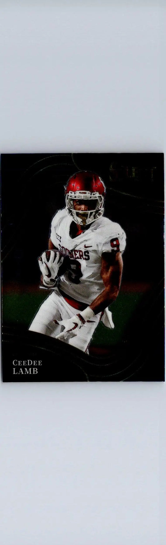 Football trading card of CeeDee Lamb in white jersey with red helmet from Panini Select Draft