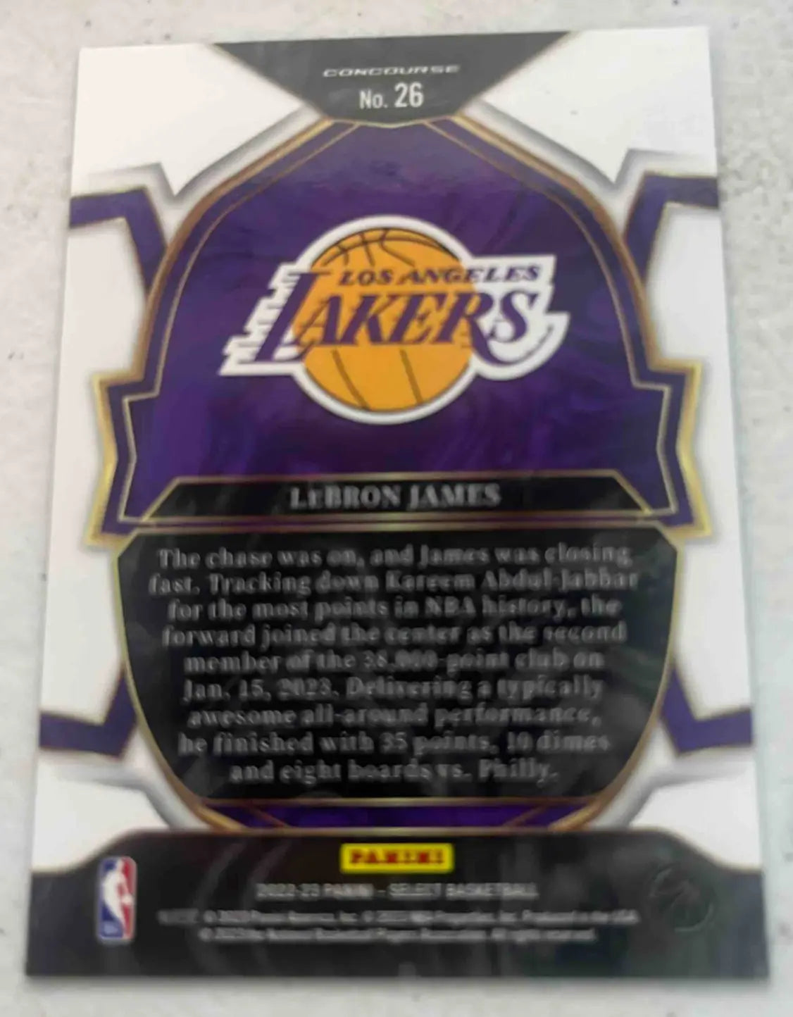 Back of a 2022 Panini Select LeBron James Blue Prizms Lakers trading card