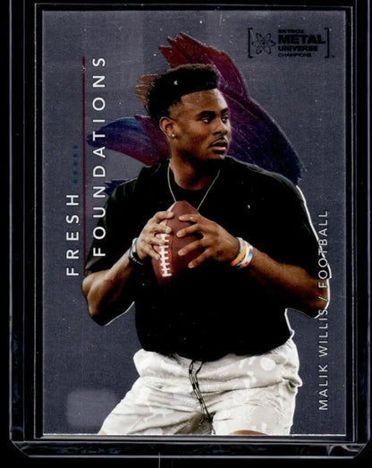 Football trading card of Malik Willis in black shirt, white pants from Skybox Metal Universe