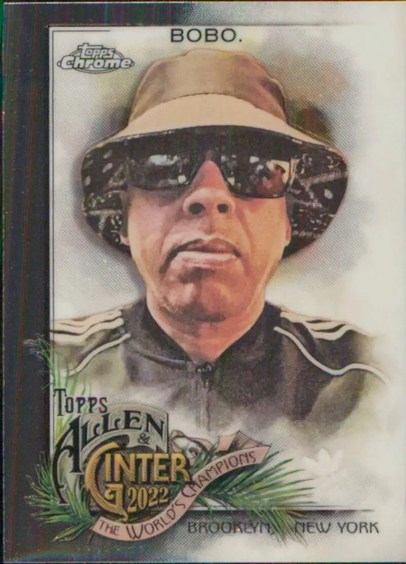 Trading card of Eric Bobo wearing sunglasses and a bucket hat from Topps Allen and Ginter