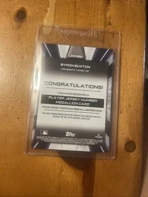Byron Buxton baseball card from 2022 Topps Byron Buxton Commemorative Jersey Number Medallion