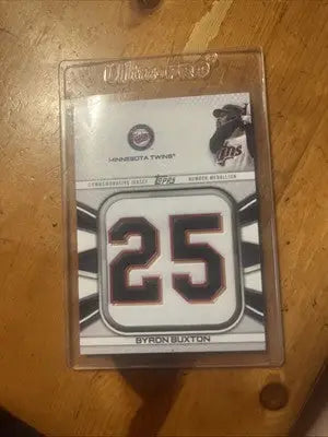 Byron Buxton baseball card from 2022 Topps Byron Buxton Commemorative Jersey Number Medallion