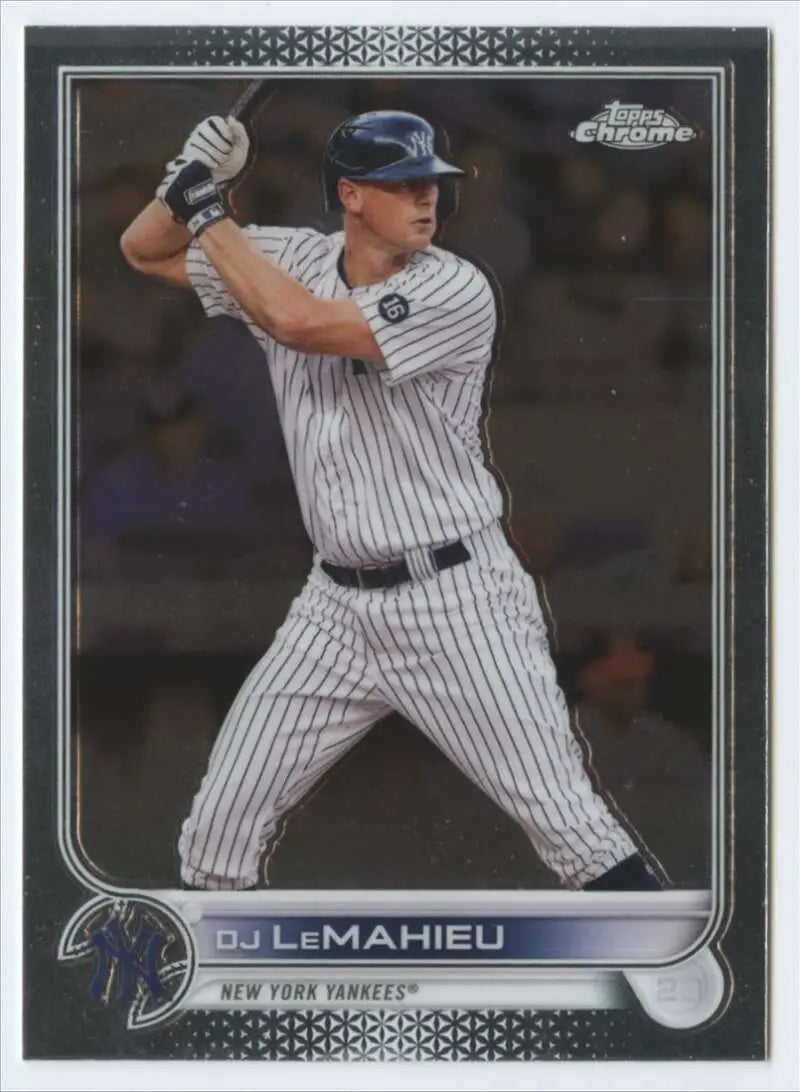 Baseball player in pinstriped uniform ready to bat on Topps Chrome Yankees card