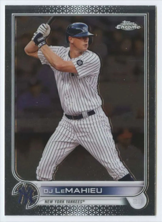Baseball player in pinstriped uniform ready to bat on Topps Chrome Yankees card