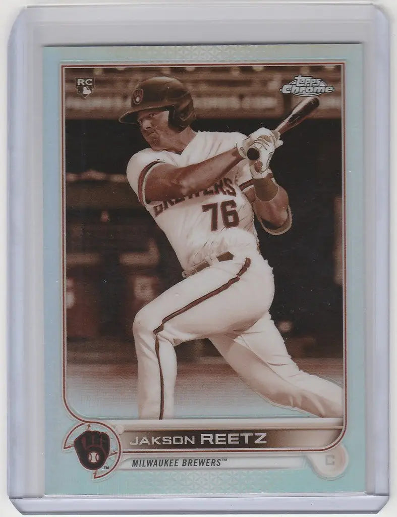 Baseball card of Jakson Reetz mid-swing from 2022 Topps Chrome Sepia Milwaukee Brewers RC