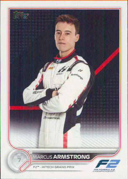 Marcus Armstrong in white racing suit with arms crossed on 2022 Topps Formula card