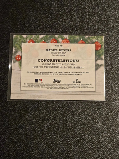 Rafael Devers relics baseball trading card from 2022 Topps Holiday series featuring relic card