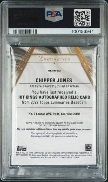 PSA-graded Chipper Jones autographed relic baseball card from 2022 Topps Luminaries