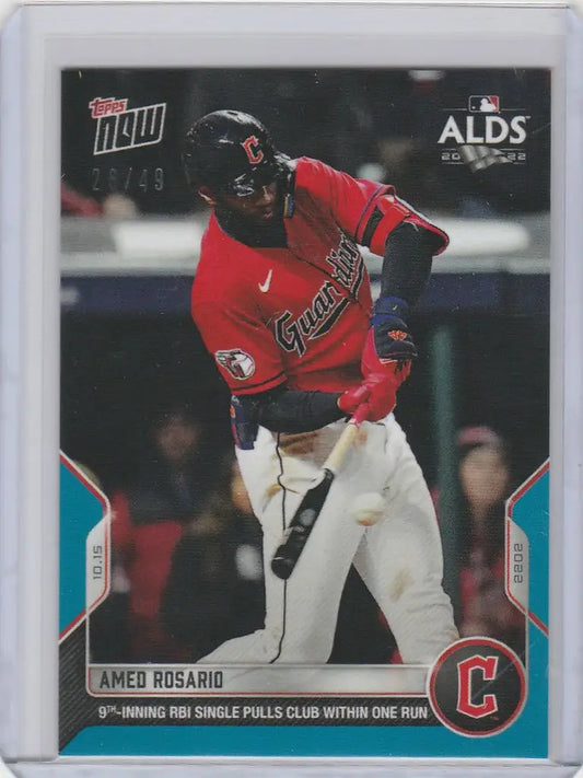 Amed Rosario Cleveland Guardians baseball card in red jersey swinging bat