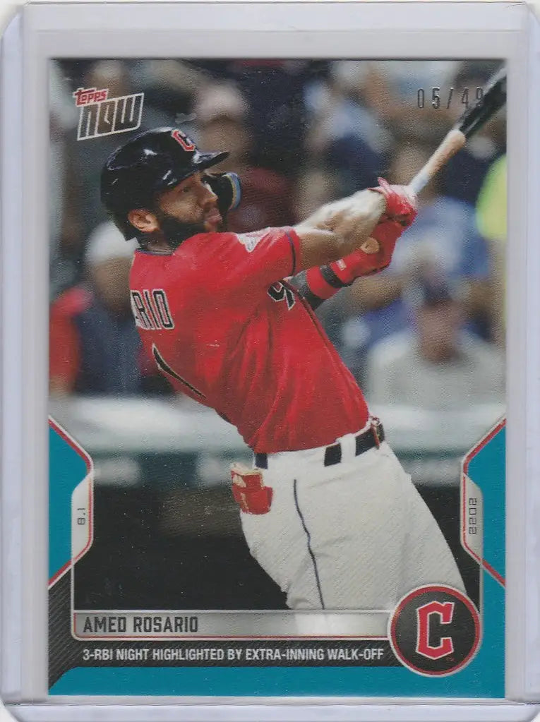 Amed Rosario Cleveland Guardians baseball card showing player in red uniform swinging bat