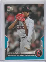 Baseball player Triston McKenzie in white uniform pitching for Cleveland Guardians