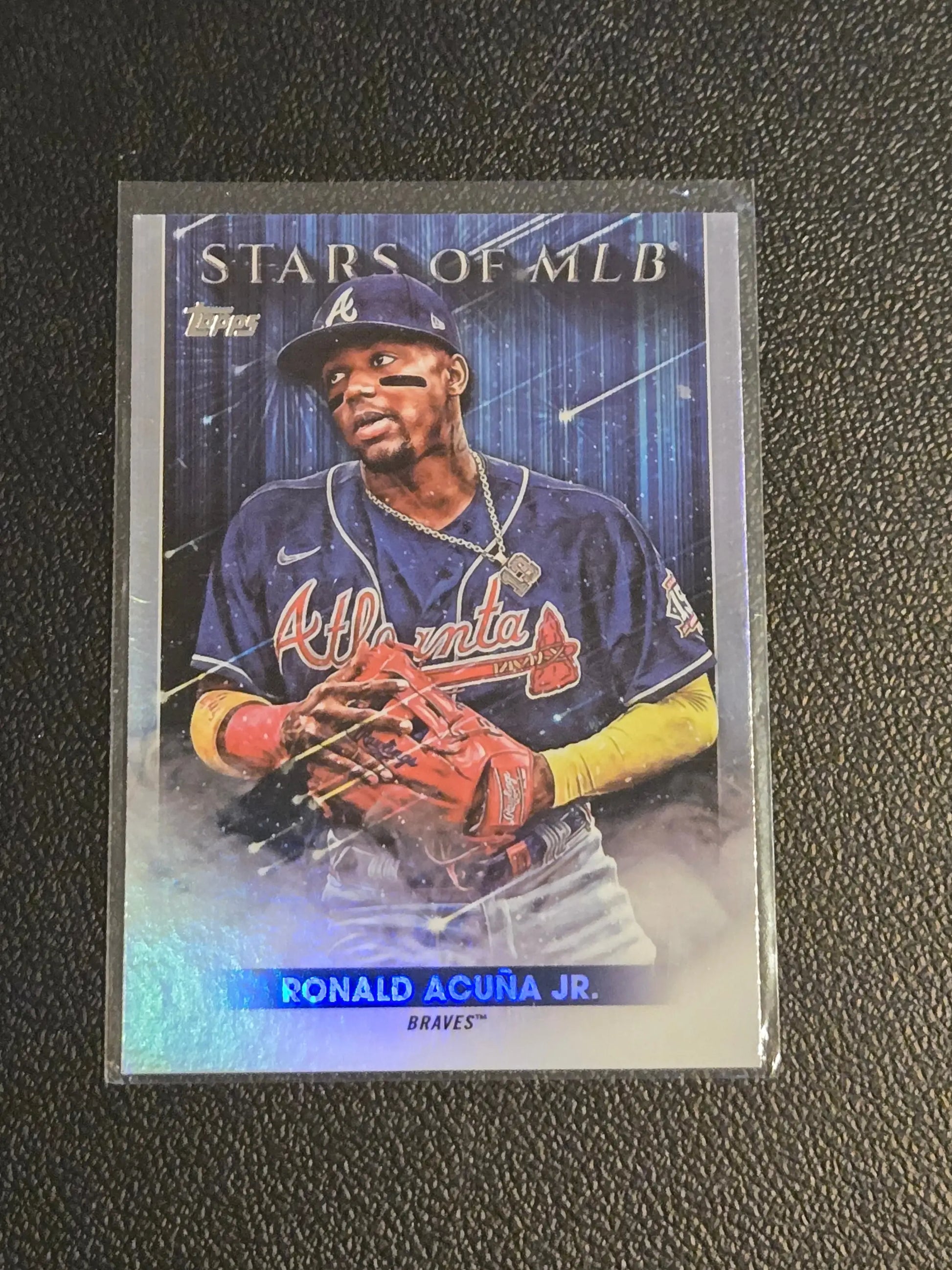 Baseball trading card featuring Ronald Acuña Jr. of the Atlanta Braves from 2022 Topps Stars of MLB