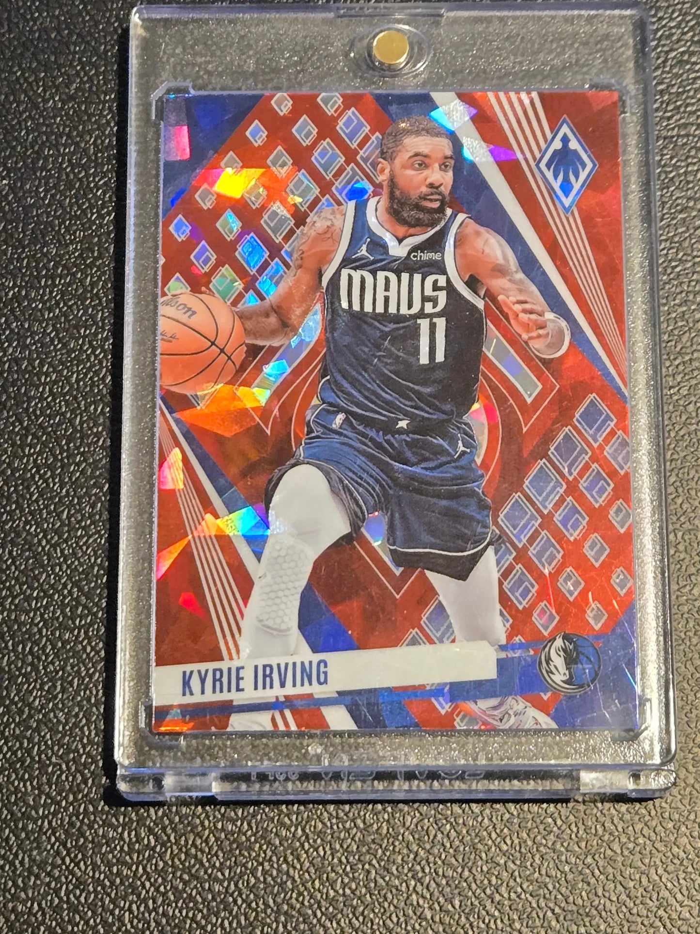 Kyrie Irving basketball card from Panini Phoenix 2023-24 featuring Kyrie Irving Red #/199