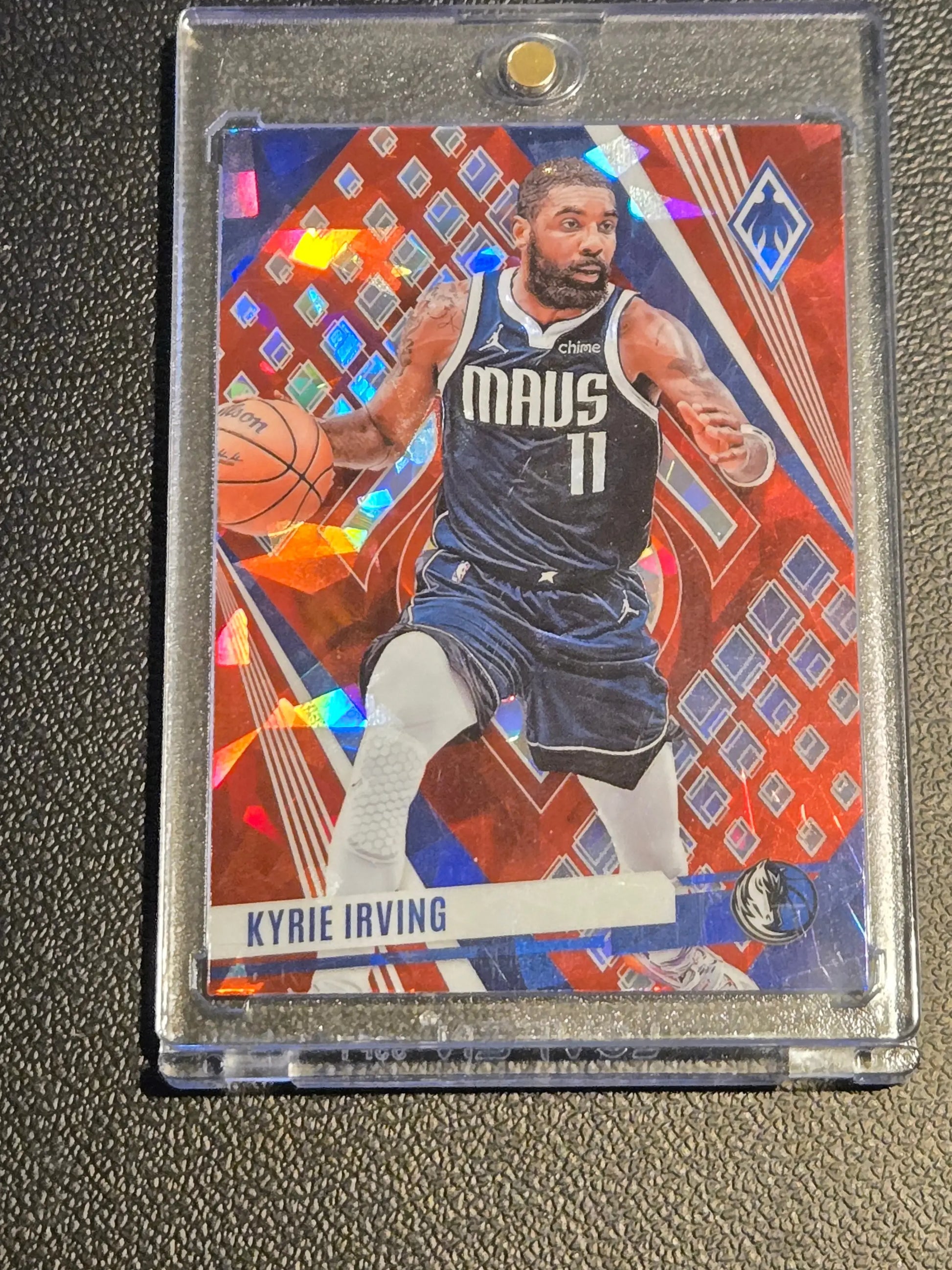 Kyrie Irving basketball card from Panini Phoenix 2023-24 featuring Kyrie Irving Red #/199