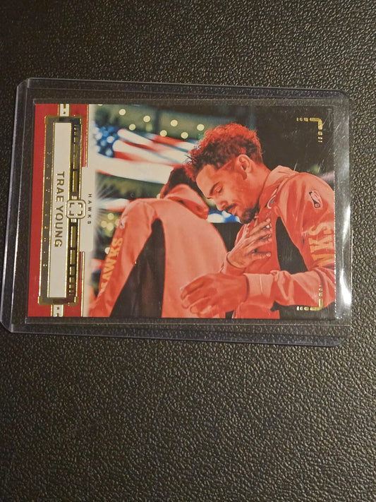 Collectible Trae Young basketball trading card from 2023-24 Panini Photogenic series