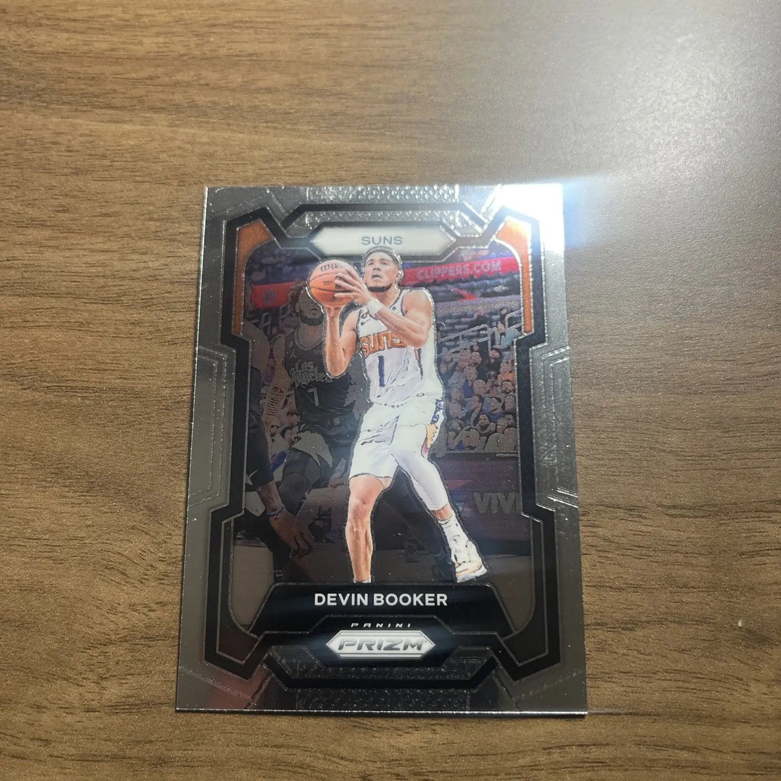 Devin Booker trading card from 2023-24 Panini Prizm Silver Prizm #58 collection