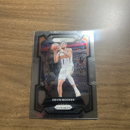 Devin Booker trading card from 2023-24 Panini Prizm Silver Prizm #58 collection