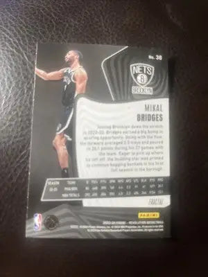 Mikal Bridges Brooklyn Nets Panini Revolution basketball card displayed in 2023-24 product