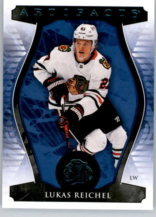 Hockey trading card of Lukas Reichel in Chicago Blackhawks jersey, Upper Deck Artifacts
