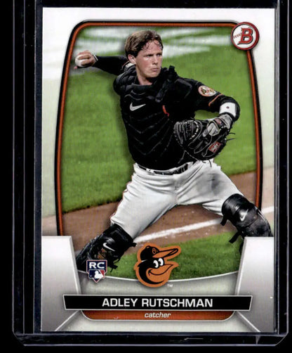 Baseball card of Adley Rutschman in throwing motion, showcasing Rutschman NM-MT quality