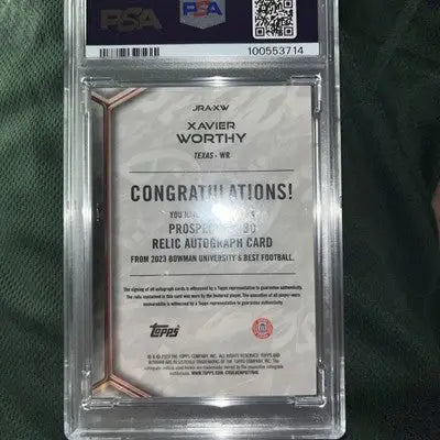 Graded 2023 Bowman University Best Xavier Worthy football trading card with relic autograph