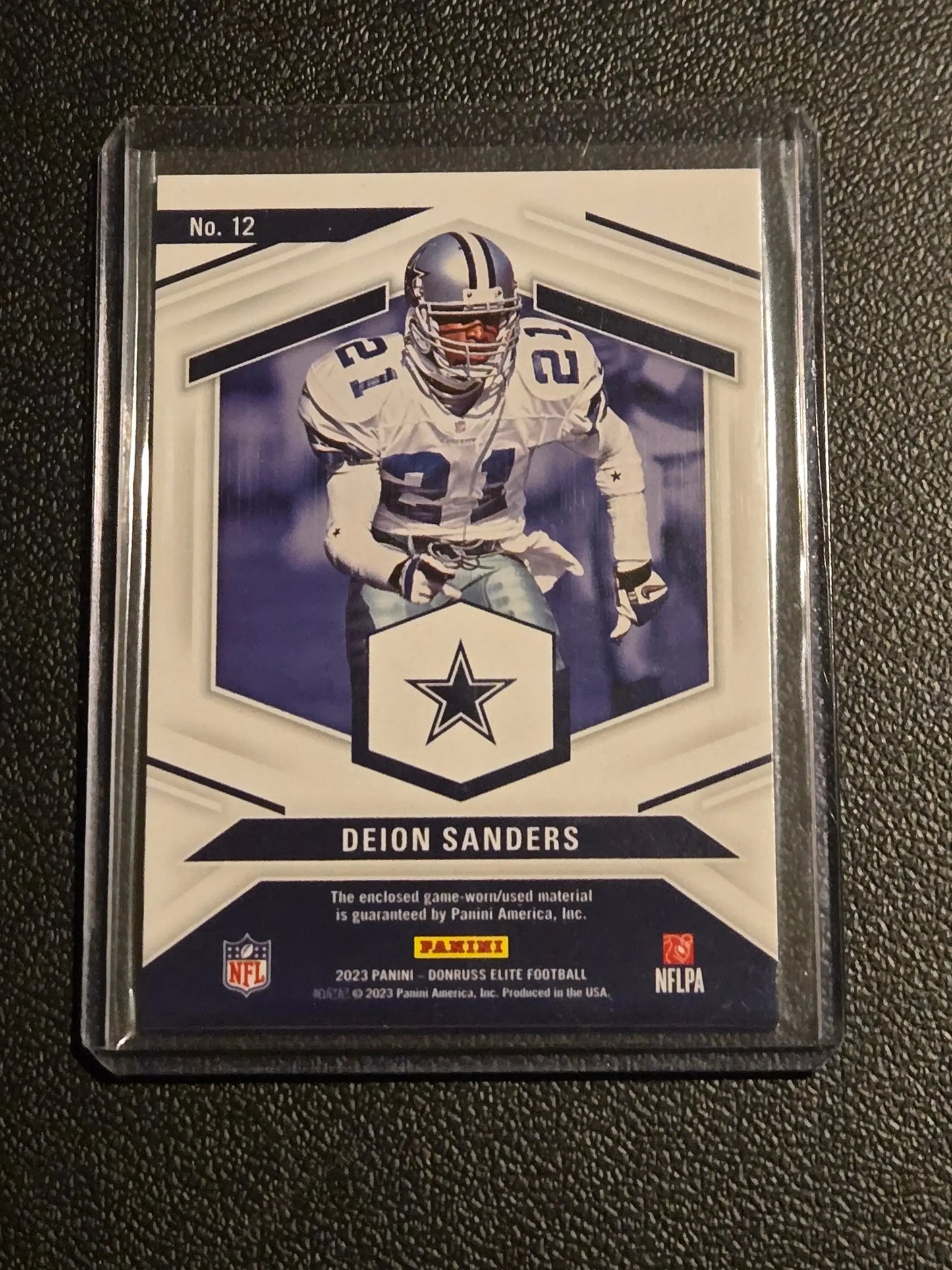 Football trading card featuring Deion Sanders in Dallas Cowboys uniform from Sanders Elite Coverage series