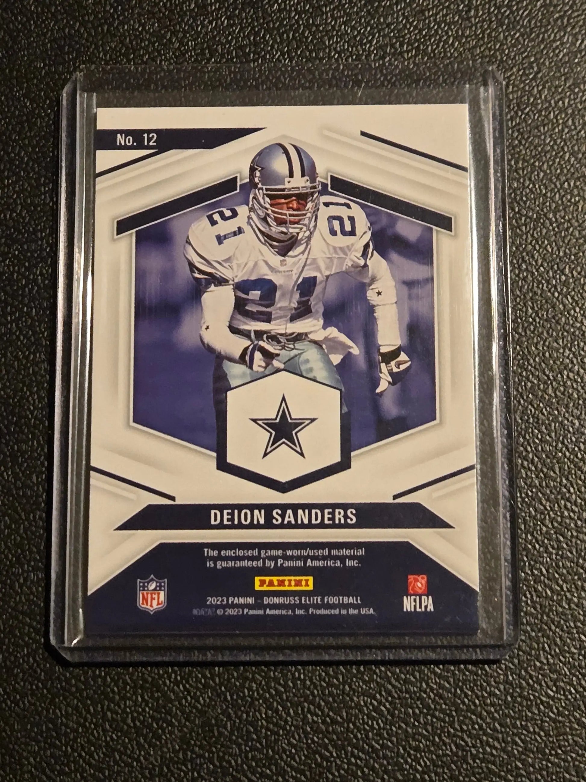 Football trading card featuring Deion Sanders in Dallas Cowboys uniform from Sanders Elite Coverage series