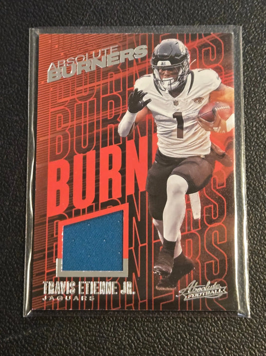Travis Etienne Jr. football trading card with jersey swatch from Panini Absolute Absolute Burners