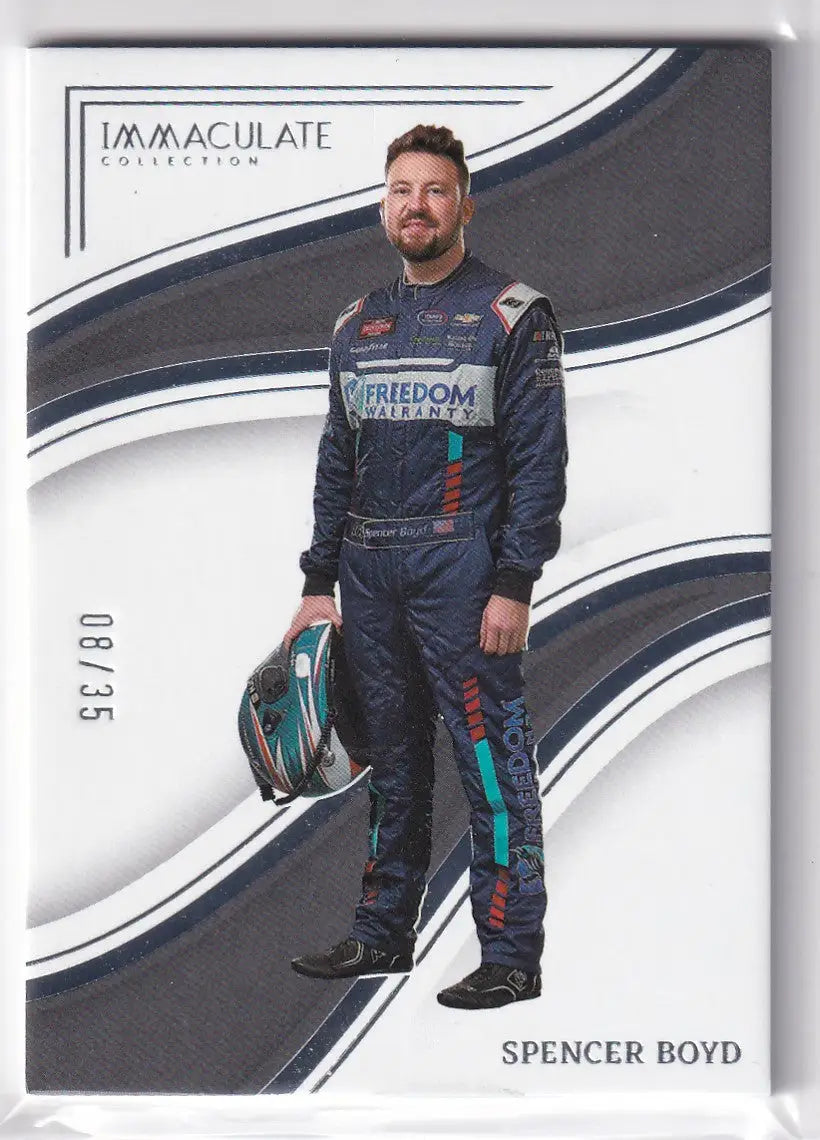 Racing driver in black Petronas suit and helmet from Panini Chronicles NASCAR Immaculate