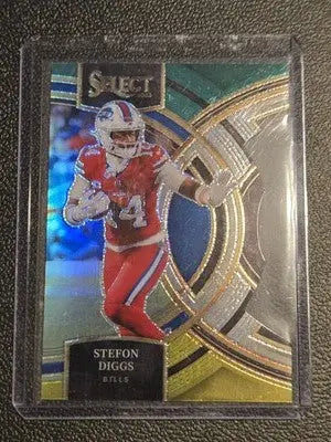 Stefon Diggs football card featuring green and yellow prizms die cuts from 2023 Panini Select