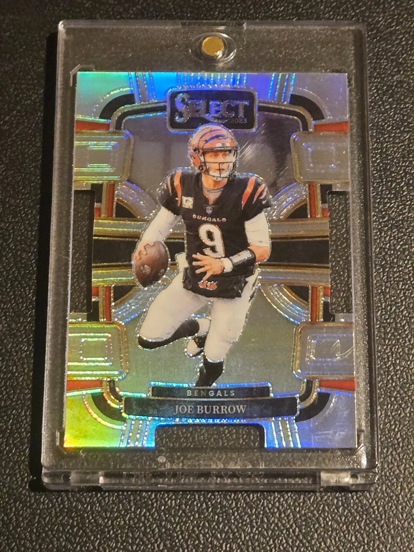 Holographic Joe Burrow football trading card in protective case from 2023 Panini Select Joe Burrow Silver Prizms
