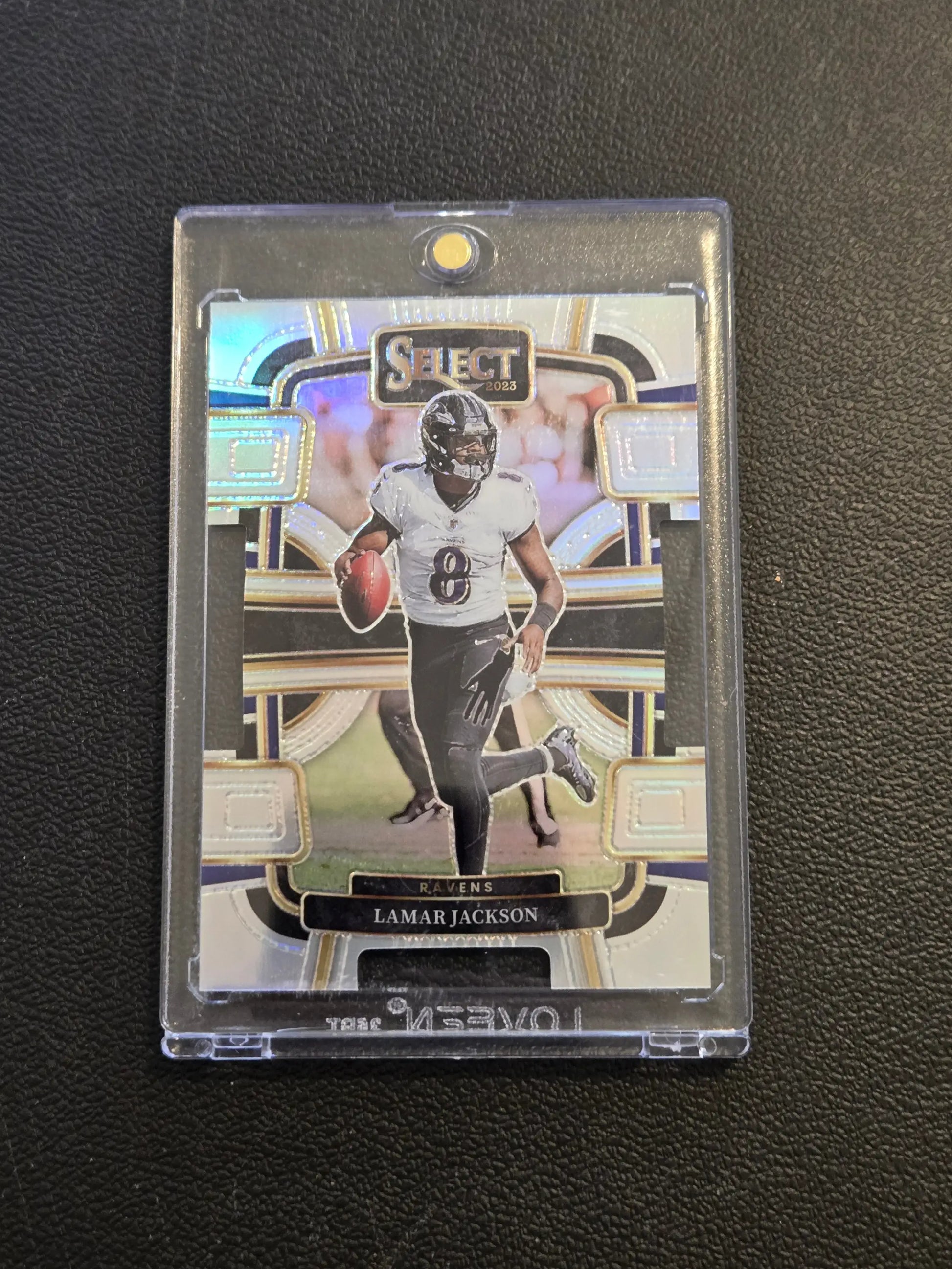 Lamar Jackson Silver football trading card in protective case from 2023 Panini Select