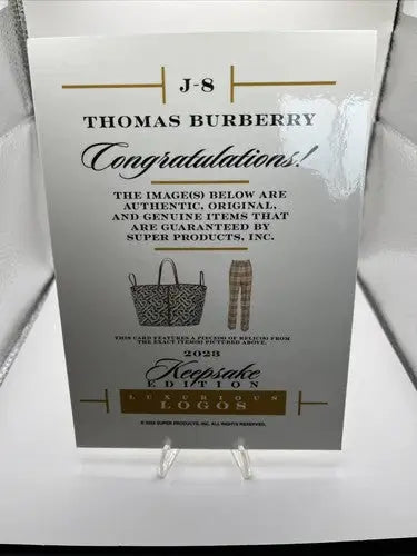 White collectible card showcasing Thomas Burberry 5x7 with luxurious logo jumbo design