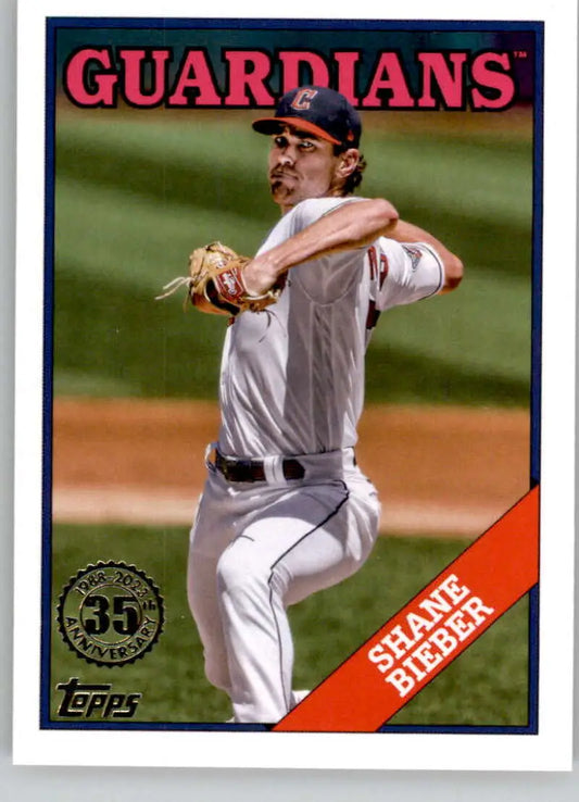 Shane Bieber pitching in white uniform on 2023 Cleveland Guardians baseball card