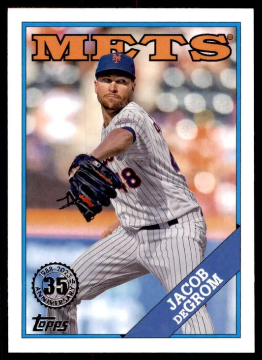 Baseball card of Jacob deGrom in pinstripe uniform for New York Mets mid-delivery