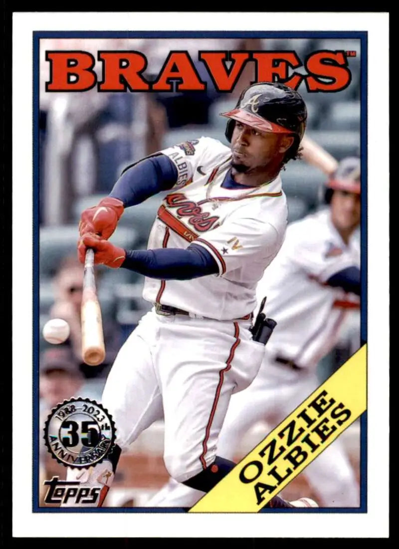 Ozzie Albies swinging a bat on a 2023 Topps Atlanta Braves Baseball Card