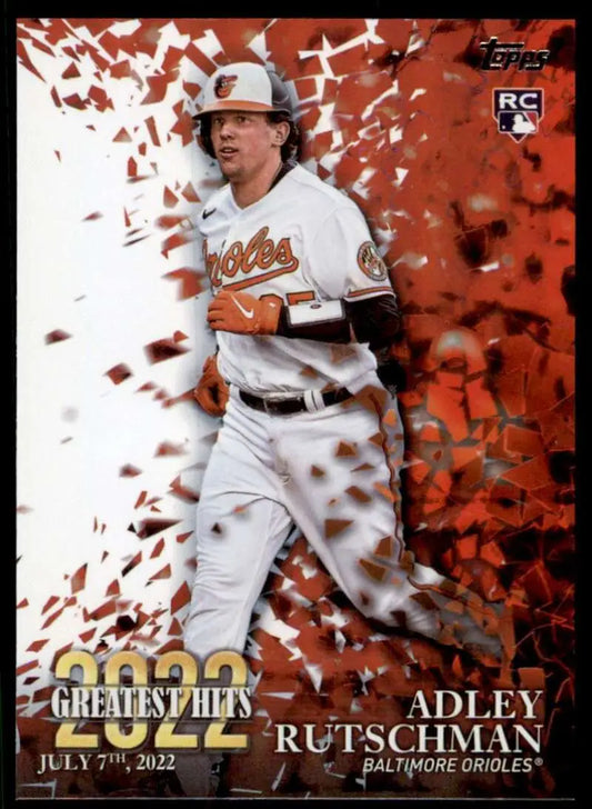 Baseball card of Adley Rutschman in white uniform for Baltimore Orioles with red background