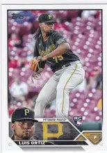 Baseball card of Luis Ortiz RC mid-throw for Pittsburgh Pirates 2023 Topps #582