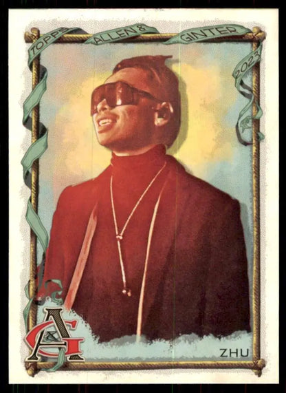 Vintage portrait of performer in sunglasses and red turtleneck from Topps Allen baseball card