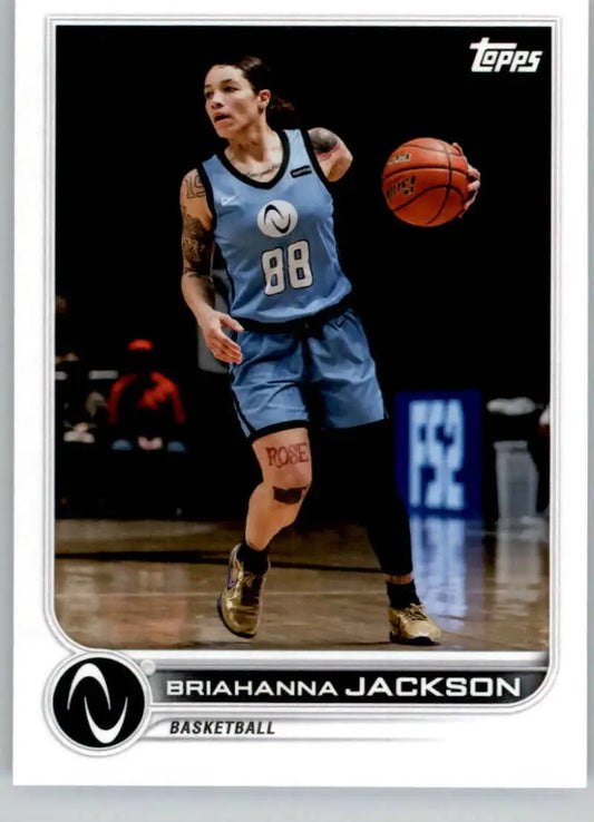 Briahanna Jackson dribbling a ball in light blue uniform from Topps Athletes Unlimited card